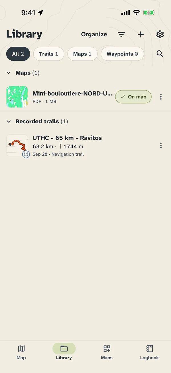 The Library listing a PDF map shown on the map and a recorded 63 km trail with its route thumbnail